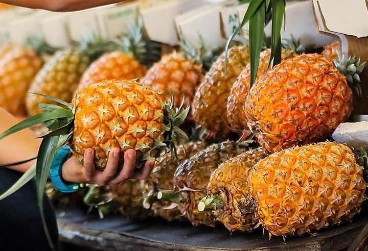 Buy pineapple and cheese at the local market – Mercado da Graça